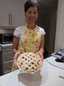 Sue showing her unbaked pie