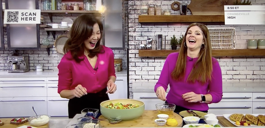 Sue Mah in the TV kitchen studio with host Lindsey Deluce