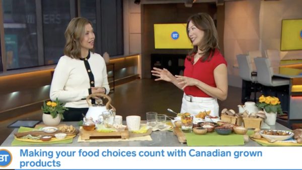 Sue with Breakfast TV host Melanie Ng talking about Canadian grown crops