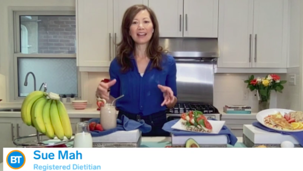 Sue is in her kitchen with food displays